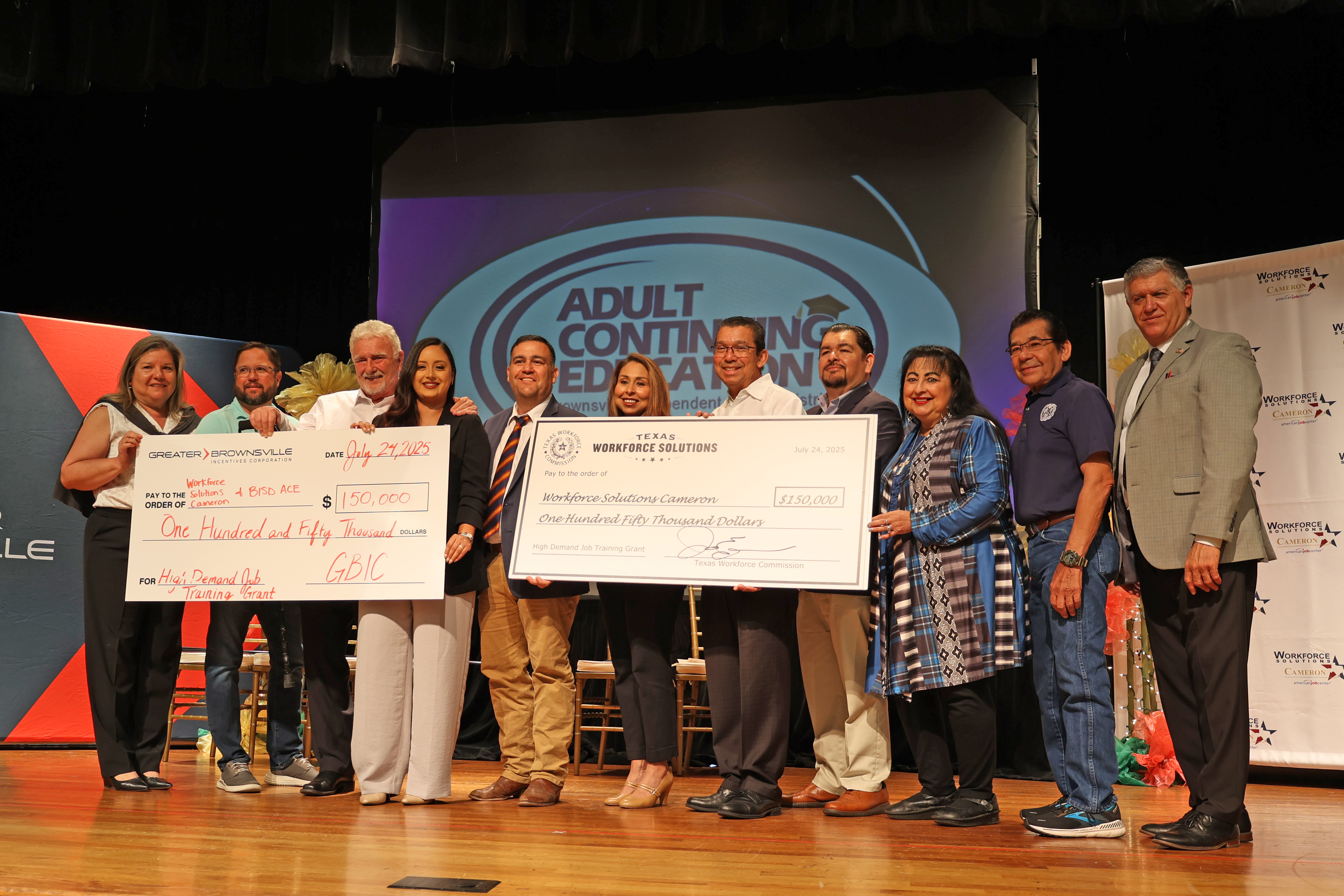 TWC Commissioner Representing Employers Joe Esparza and local partners attend big check ceremony