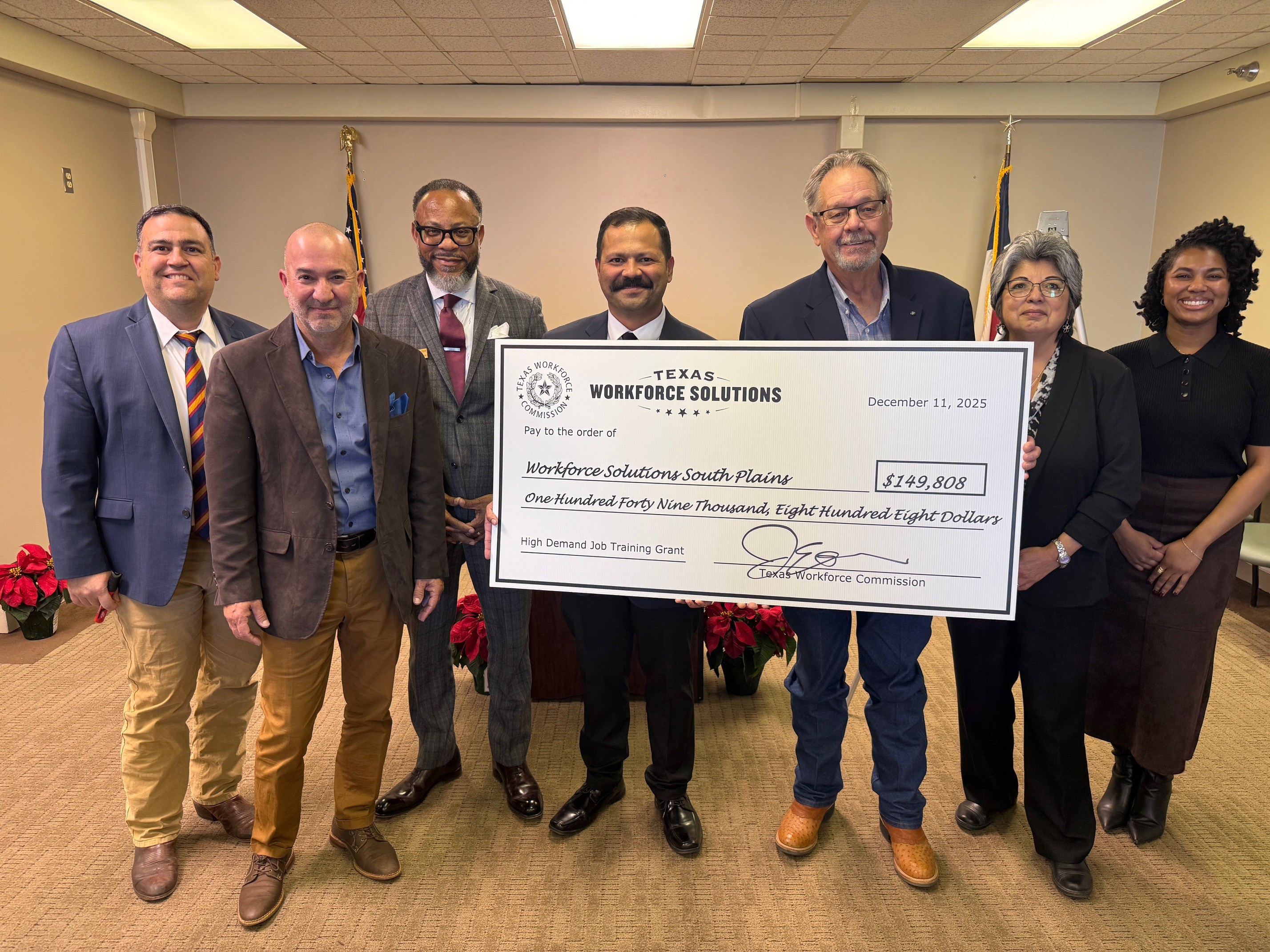 TWC Chairman Joe Esparza and local partners attend big check ceremony.