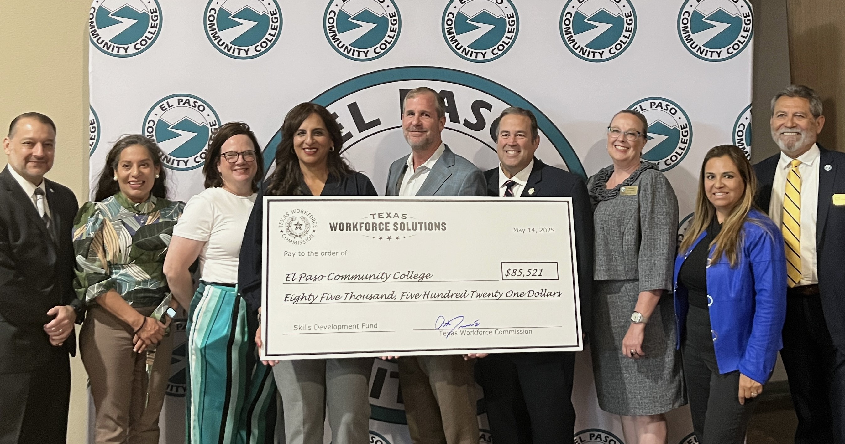 TWC Commissioner Representing Labor Alberto Treviño III presents a ceremonial Skills Development Fund grant check to local partners