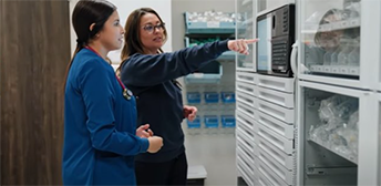 A clip from the Apprenticeship Texas video feature and apprentice and her mentor in a medical equipment room.