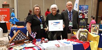 A group of people at a 2024 Hiring Red, White and You Event.