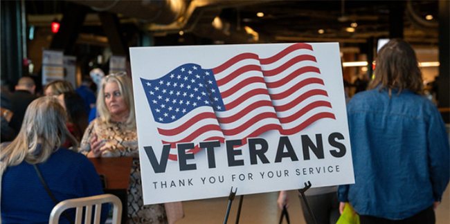 A sign thanking veterans for their service that was on display at a Hiring Red, White and You! event.