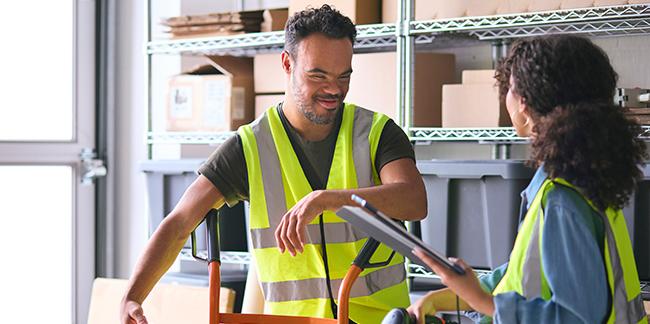 Man with a disability working in a warehouse